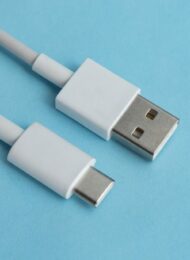 USB cable type C over blue background